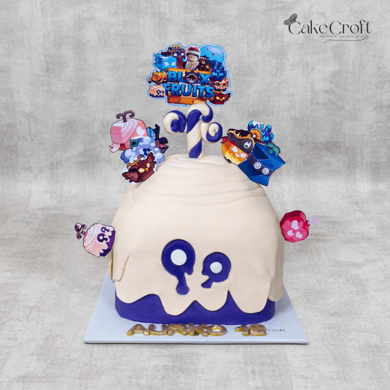 A Blox Fruits-inspired birthday cake with a unique melting effect, purple and cream fondant design, and themed edible toppers featuring characters from the game.