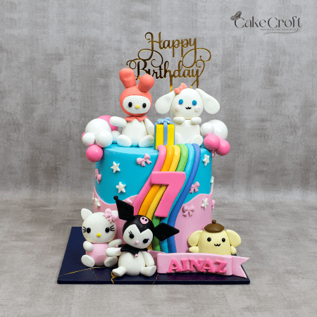 Colorful Sanrio-themed birthday cake featuring rainbow elements and fondant figures of Kuromi, Hello Kitty, Cinnamoroll, My Melody, and Pom Pom Purin, perfect for a 7th birthday celebration.