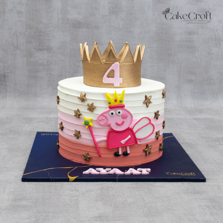 Peppa Pig princess-themed birthday cake with a golden crown topper, ombre pink layers, and gold stars for a 4-year-old’s celebration.