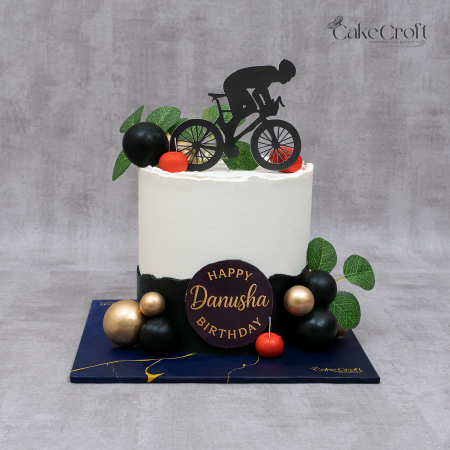 A modern cycling-themed cake perfect for biking lovers.