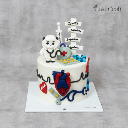 Doctor theme fondant cake with medical heart, stethoscope and doctor figurine in Dhaka