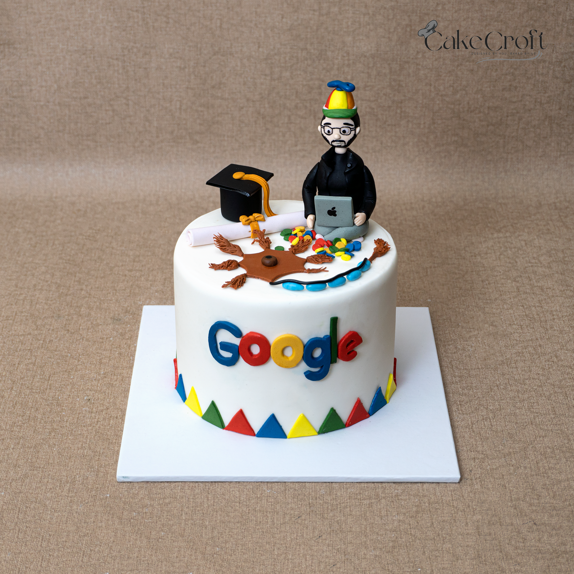 Google theme graduation cake with laptop figurine in Dhaka