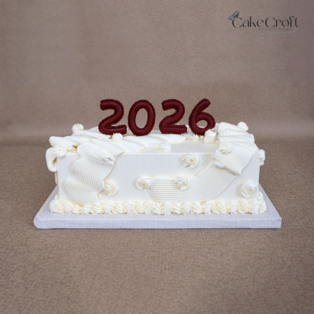 2026 celebration cream cake with wave piping design in Dhaka